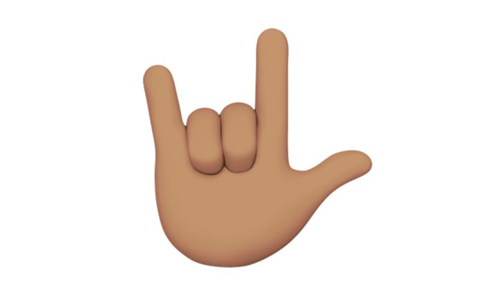 Descrição da imagem #PraCegoVer: Imagem no formato retangular, na horizontal. Ilustração do emoji inclusivo, com a frase Eu te amo, universal, na língua de sinais. Fim da descrição.