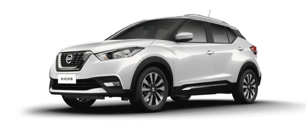 Descrição da imagem #PraCegoVer: Imagem em formato retangular, na horizontal. Nela está o modelo Nissan Kicks, na cor branco diamond. Fim da descrição.