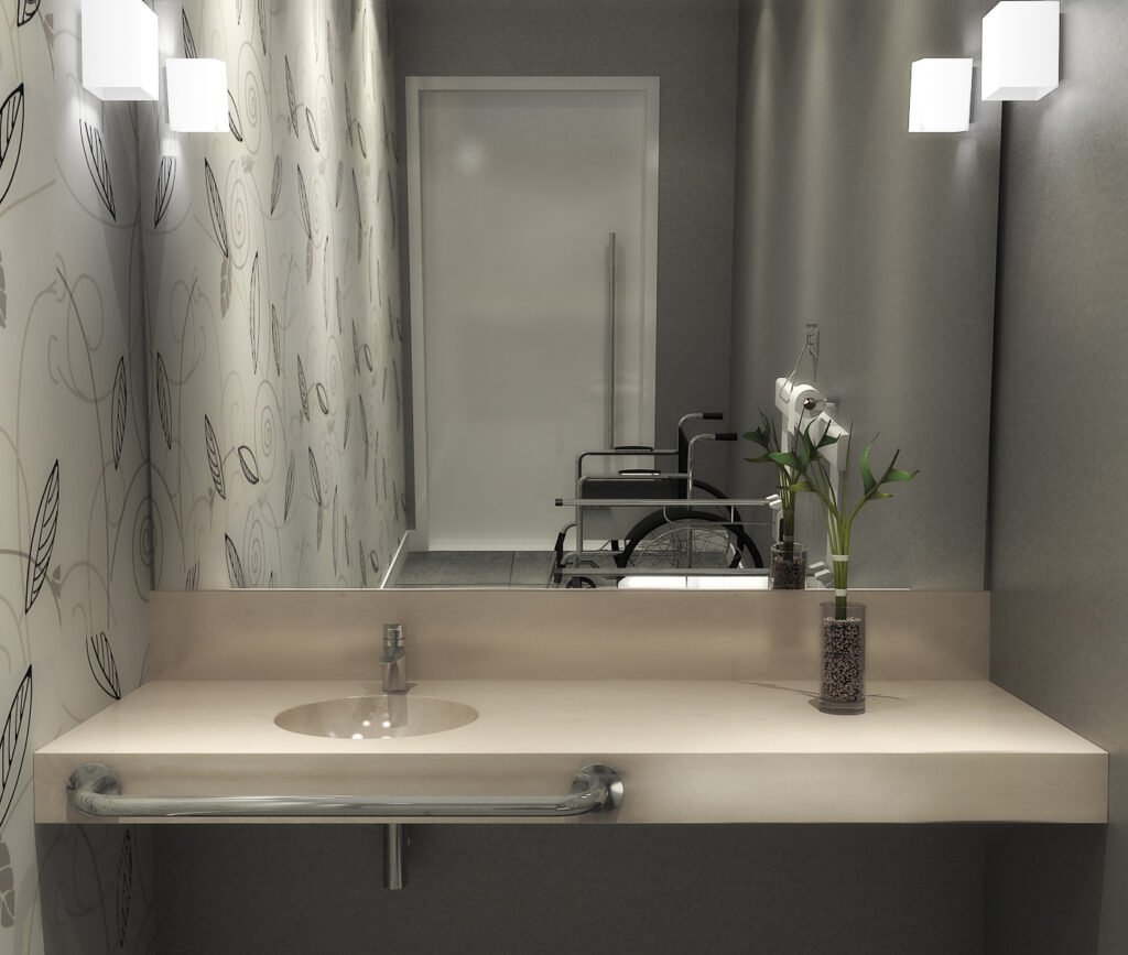 Descrição da imagem #pracegover: Imagem do lavabo vista a partir do espelho do ambiente. Sobre a bancada da pia está um vaso com flores brancas. Fim da descrição.