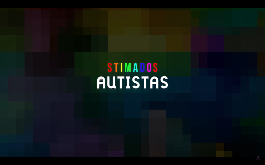 Descrição da imagem #pracegover: Print da abertura do documentário Stimados autistas. Nele vemos escrito Stimados em letras coloridas e Autistas em branco. Fim da descrição.