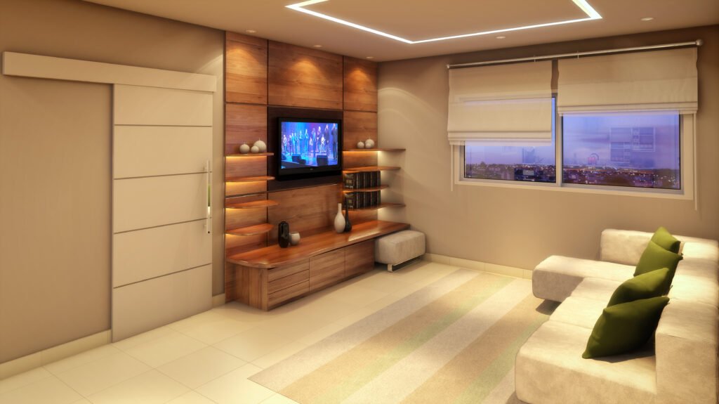 Descrição da imagem #pracegover: Perspectiva do living. Na imagem estão o rack com a TV e o sofá. Fim da descrição.