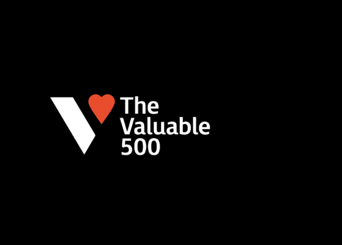 Descrição da imagem #pracegover: Imagem com fundo preto. No centro está o logo do The Valuable 500, formado pela letra V e pela imagem de um coração vermelho. Fim da descrição.