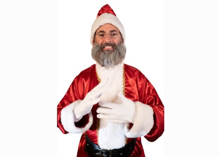 #descriçãodaimagem: foto do Papai Noel surdo. Fim da descrição.
