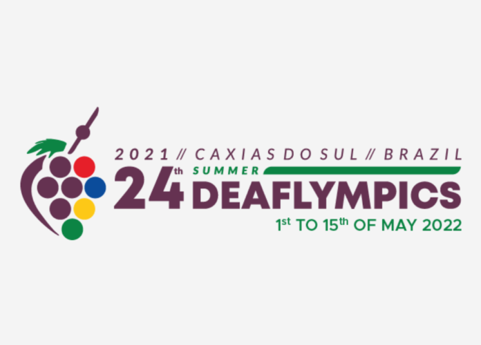 Descrição da imagem: Arte de divulgação da Summer Deaflympics. A imagem traz o logo do evento, que tem como destaque um cacho de uva, com pequenos círculos coloridos representando as uvas que formam o cacho. Fim da descrição.