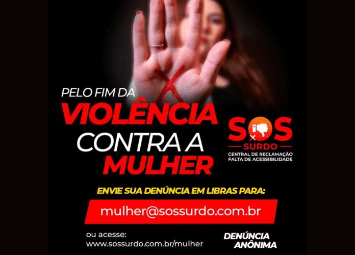Descrição da imagem: Foto de uma mulher mostrando a palma da mão com um x vermelho. A imagem tem fundo preto e traz informações sobre o serviço de denúncia. Fim da descrição.