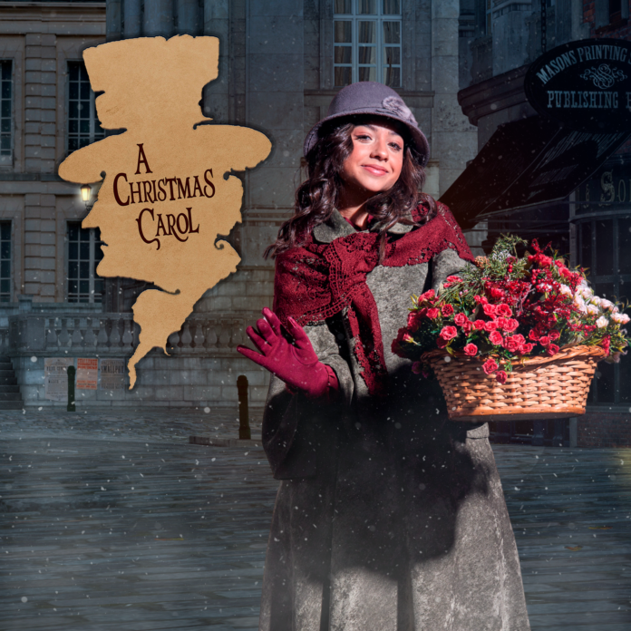Descrição da imagem: foto de uma das personagens do musical. Uma mulher com uma cesta de flores. Ao lado está uma arte com o nome da peça: A Christimas Carol. Fim da descrição.