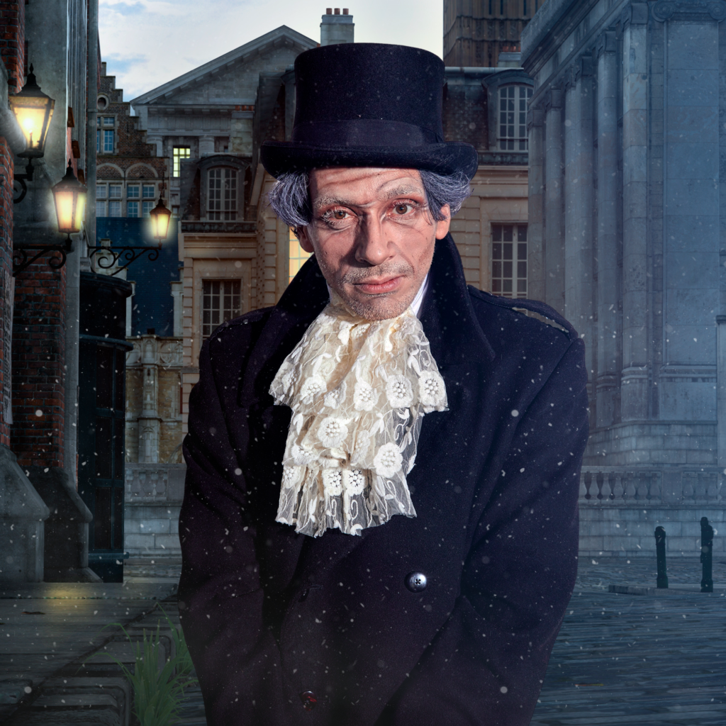 Descrição da imagem: foto de uma personagem do musical. Um homem cacterizado. Fim da descrição.